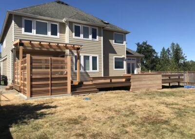 Outdoor deck with privacy screen